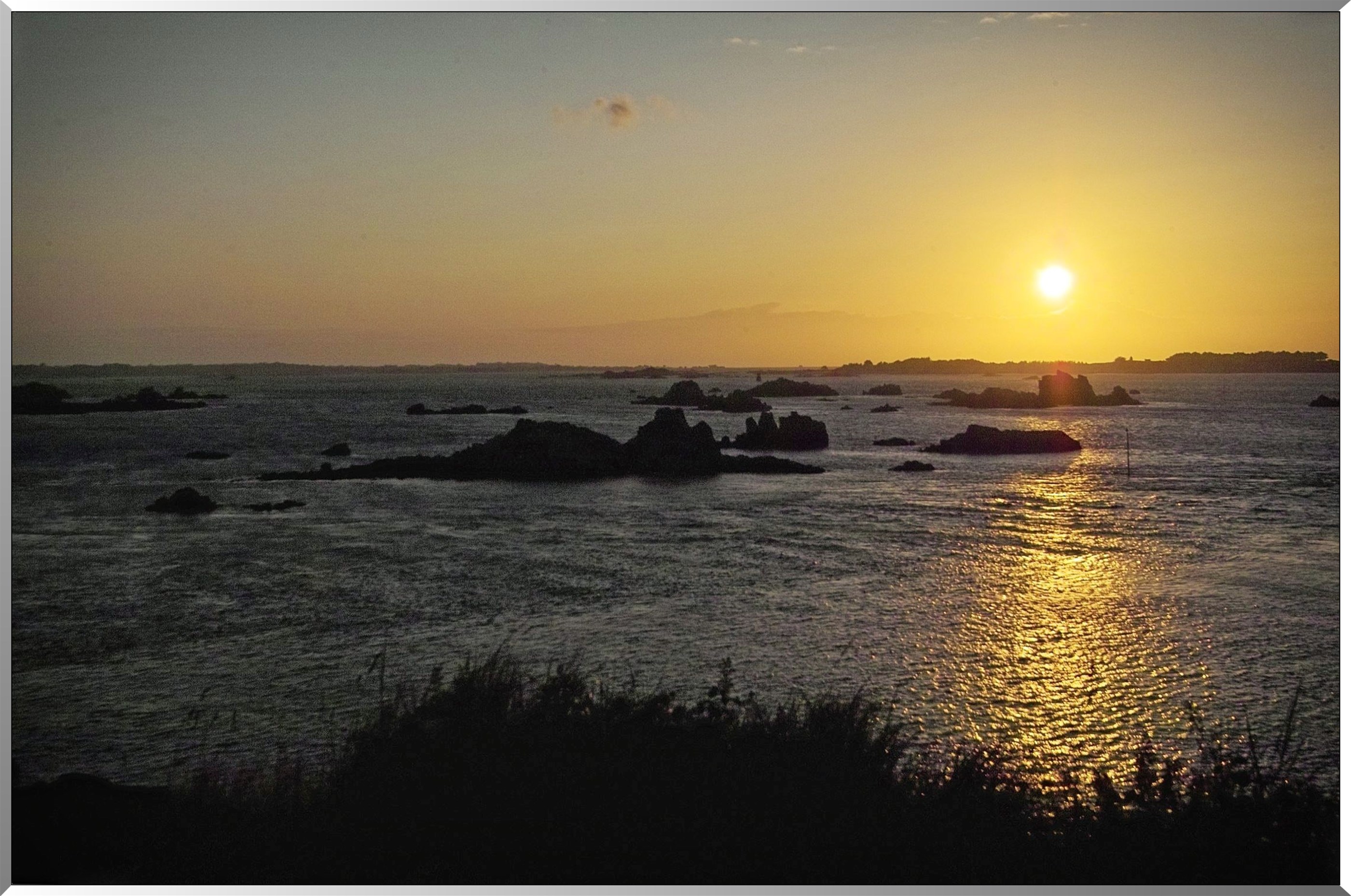 Côte ouest - Vue de la croix Maudez - Soleil-couchant